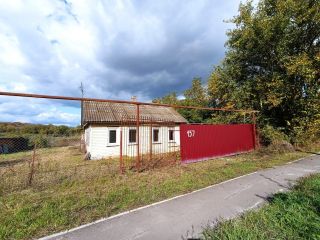 Продам деревянный дом с коммуникациями фото Х. Ин-Малеванный